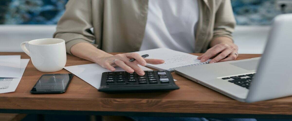 man using a calculator 3